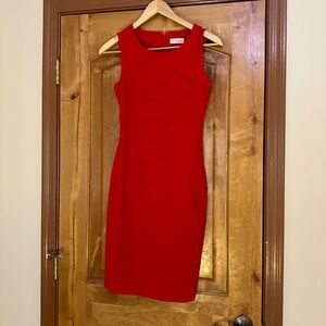 Calvin Klein red sunburst cocktail dress